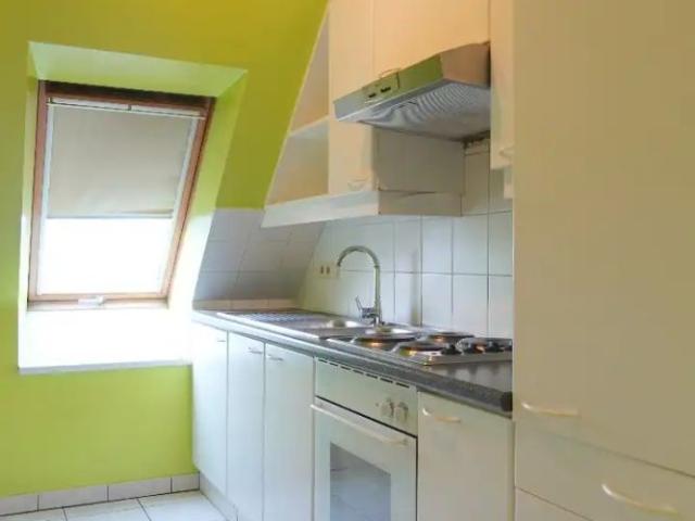Duplex appartement met zicht op de markt