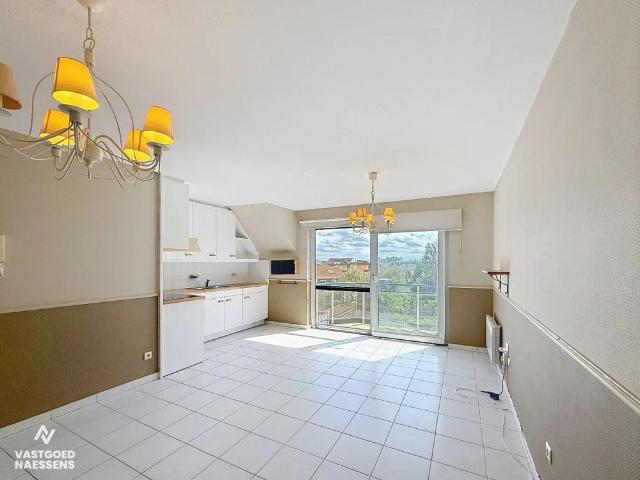DUPLEX APPARTEMENT MET 1 SLPK EN TERRAS
