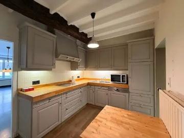 Duplex appartement met 2 slaapkamers en dakterras in het centrum van Maaseik