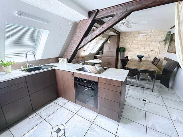 Duplex atypique de 130 m2 en hyper centre avec parking