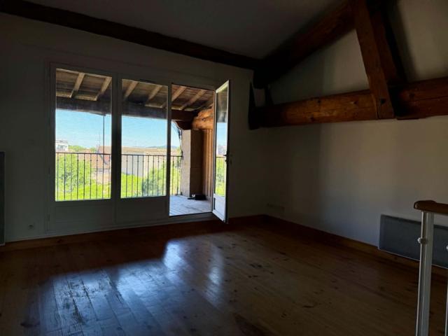 DUPLEX DANS UN ESPRIT LOFT AVEC TERRASSES ET PARKING