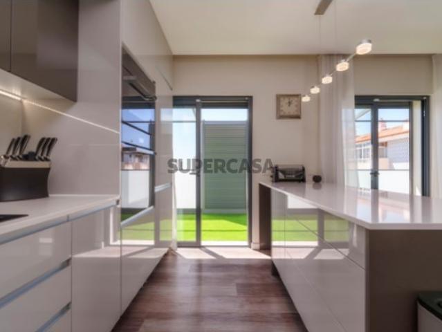 Duplex de Luxo no Coração de Loulé com Terraço e Vista Mar