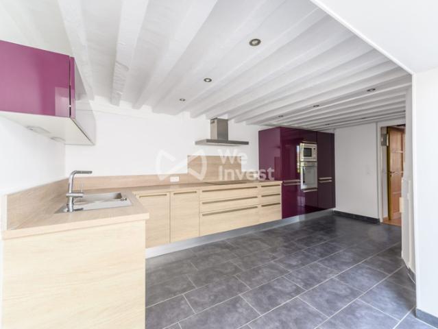 Duplex de Prestige: Un Refuge de Sérénité et d'Élégance