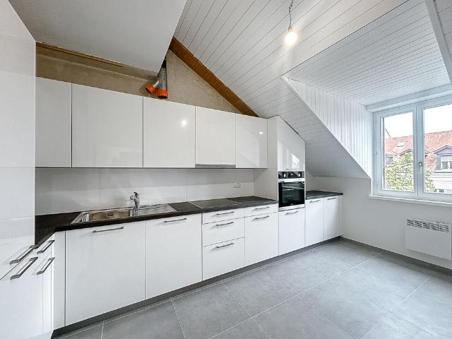 Duplex en attique rénové dans le vieux Carouge