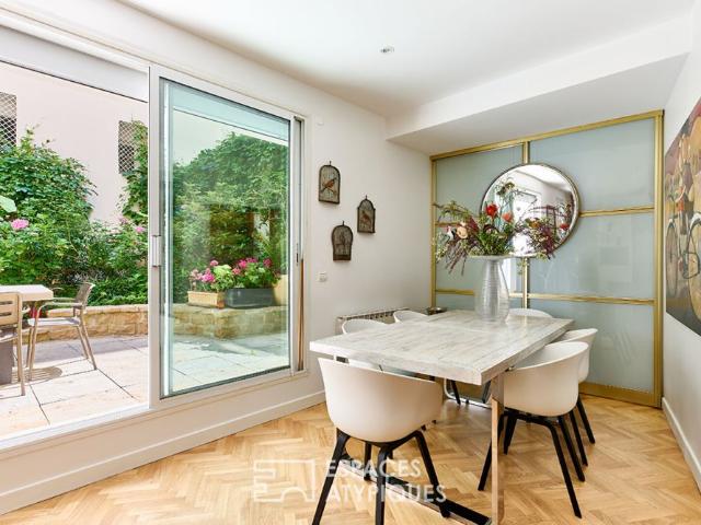 Duplex familial avec terrasse végétalisée à proximité de la Place de la Madeleine