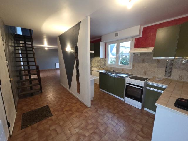 DUPLEX INDIVIDUEL AVEC JARDIN et GARAGE CENTRE VILLE