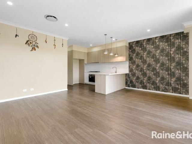 Duplex Living with Sunroom and Media Room