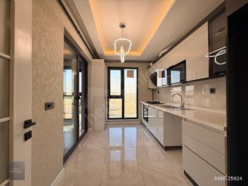 DÜZGÜN EMLAK'TAN HASTANE BÖLGESİNDE 2+1 G.CEPHE K.OTOPARKLI SİTE DAİRE