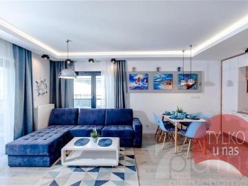 Apartament z widokiem na morze, tarasem i garażem