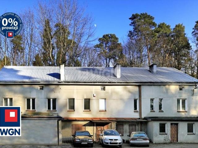 Na sprzedaż działka inwestycyjna z budynkami i parkingiem