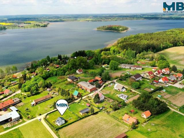 Działka z domem letniskowym nad jeziorem Dejguny, uzbrojona