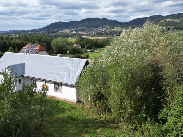 Sprzedam działkę 2100 m² z domem do remontu w Siekierczynie