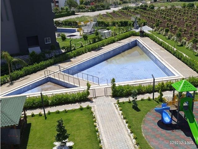 ÇEŞMELİ'DE DENİZE YÜRÜME MESAFESİN'DE HAVUZLU 1+1 CONCEPT DAİRE