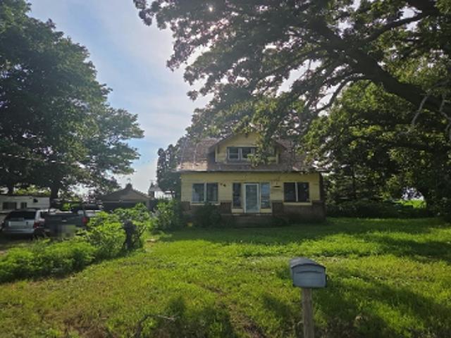 E 1180th St