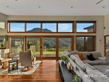'EAGLE RIDGE' MAJESTIC MOUNTAIN VIEWS, STUNNING MODERN HOME ON SECLUDED ACREAGE AT THE BASE OF THE WESTERN TIERS