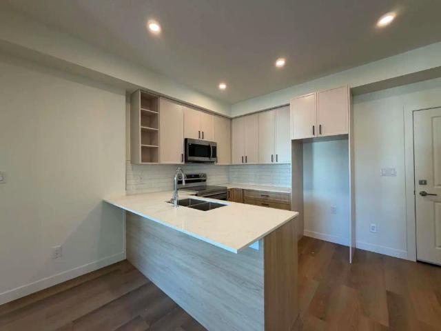 East Pine Apartments — The Meadow 2 Bedroom + Den