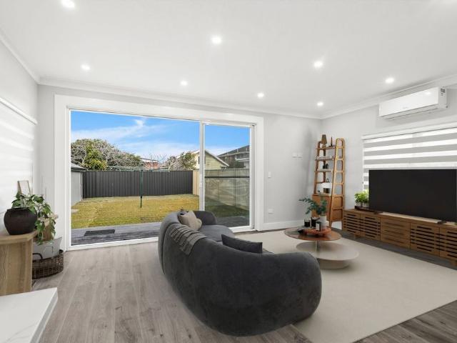 Easy Modern Living in Prized Beachside Pocket