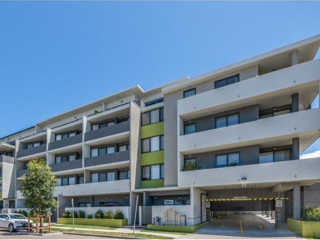 EASY CARE APARTMENT LIVING WITH BALCONY & GARAGE