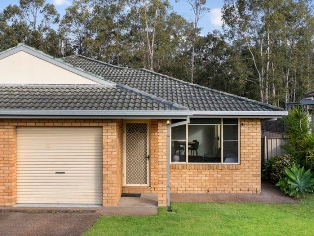 Easy Care Duplex Living, Backed by Extra Outdoor Space