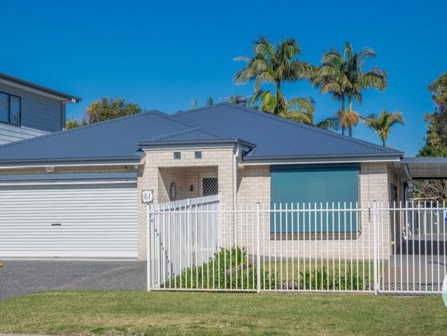 Easy Care One Level Coastal Living, Great Side Access & Garaging, Fabulous Floorplan, Much More Modern & Brick! Seconds to Shops & Water!