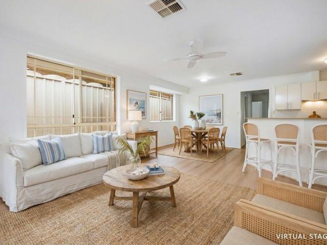 Easy Care Level Living in an Ultra Convenient Location