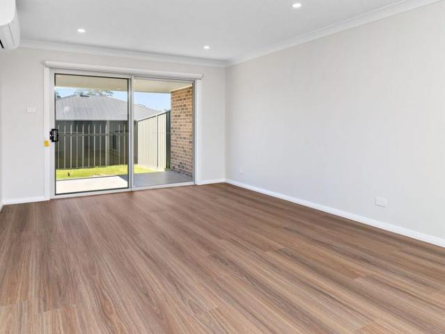 EASY CARE LIVING IN A BRAND NEW DUPLEX