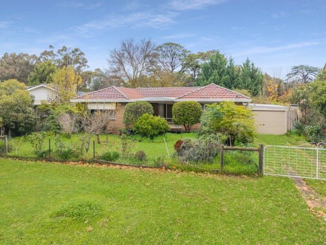 EASY CARE LIVING IN A NEAT BRICK HOME
