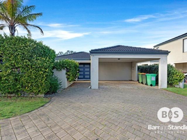 Easy Care Living in a Peaceful Pelican Point Location