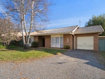 Easy Care Living in a Quiet Bright Location
