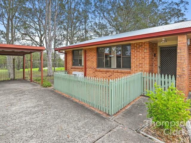 Easy Care Living with Comfort, Convenience & Golf Course Outlook