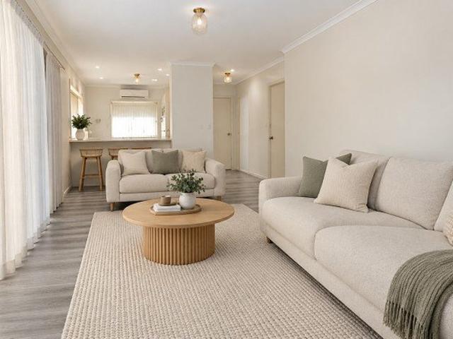 Easy Care Living with a Spacious Backyard