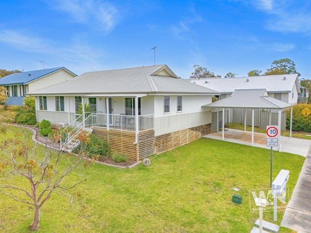 EASY CARE LIVING WITH ROOM FOR THE FAMILY