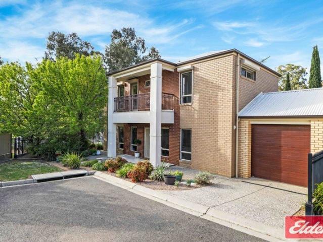 Easy Care Living with the Park at Your Back Door