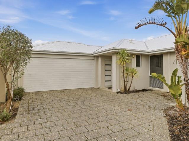 EASY CARE LIVING WITHIN A PEACEFULLY PLACED SETTING WITH PARKLAND ACROSS THE ROAD