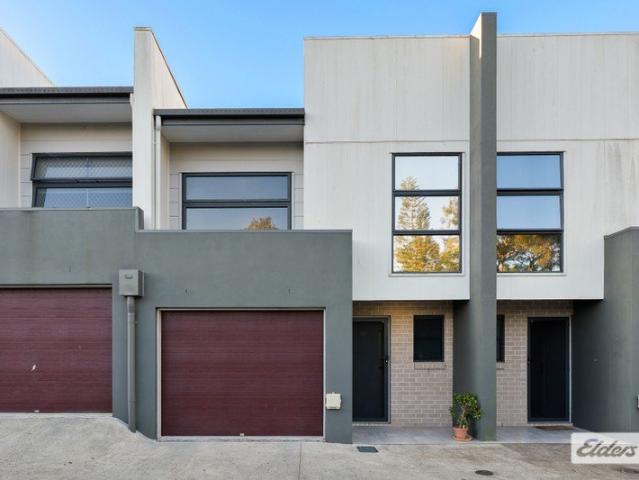 EASY CARE TOWNHOUSE LIVING WITH MULTIPLE OUTDOOR SPACES