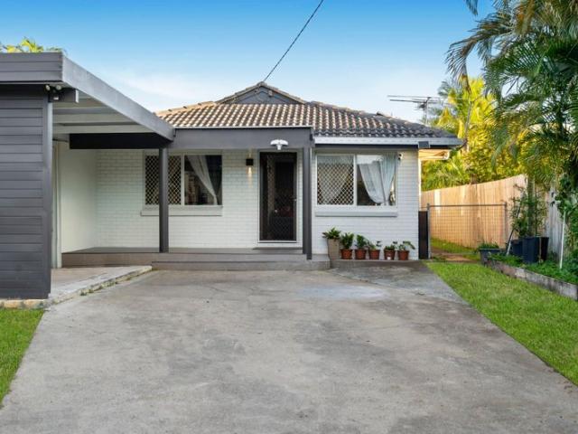 Easy Family Living with a Big Patio, Double Garage & Backyard Extras