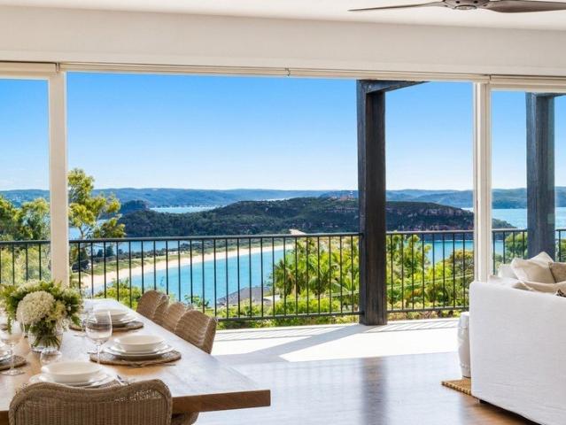 Easy Luxury Living in a Private Palm Beach Position