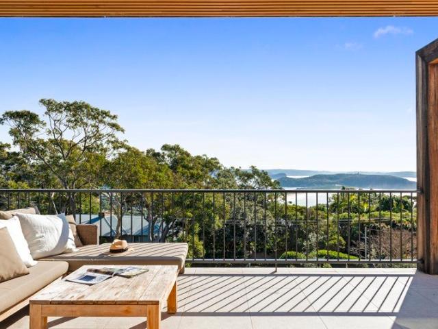 Easy Luxury Living in a Private Palm Beach Position