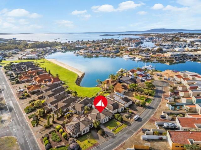 Easy Living in a Sought After Sandy Point Location