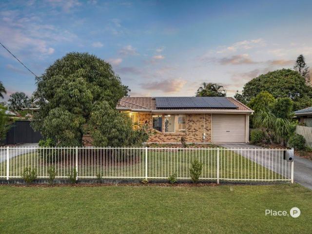 EASY SINGLE LEVEL LIVING WITH UPDATES AND SIDE ACCESS