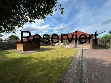 Ebenerdiger Walmdachbungalow in SandkrugHatterwüsting