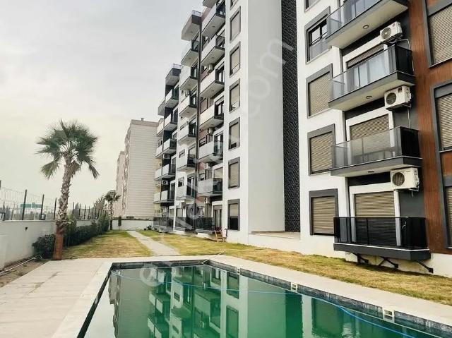 Ege Üni. Türk Koleji Yakını Güvenlikli Sitede Eşyalı 1+1 Kiralık