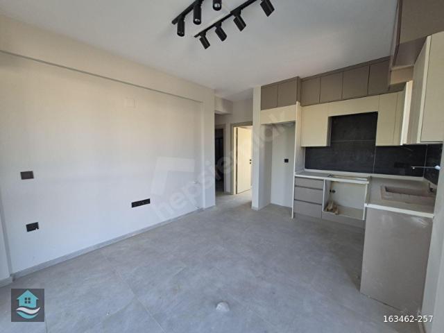 EGEPORTTAN ORTACA'DA BAHÇE NİZAM MÜLKİYETLİ 1+1 SATILIK DAİRE