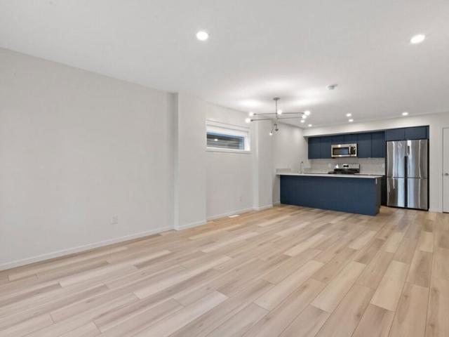 Edmonton Unfurnished townhouse Rental in Parkdale Brand New Bright and Modern 3 Bed Main Suite with A/C & a Private Patio!