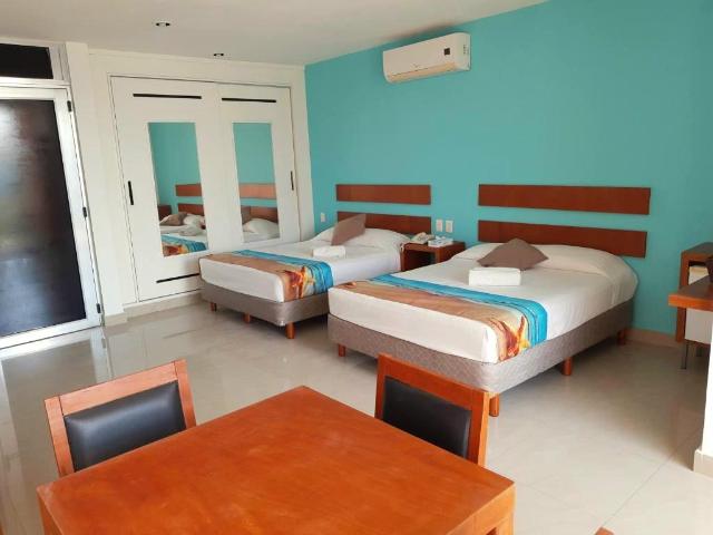 EDIFICIO COMERCIAL CON STUDIOS Y LOCAL Y BODEGA EN VENTA ZONA TURISTICA DE PLAYA DEL CARMEN