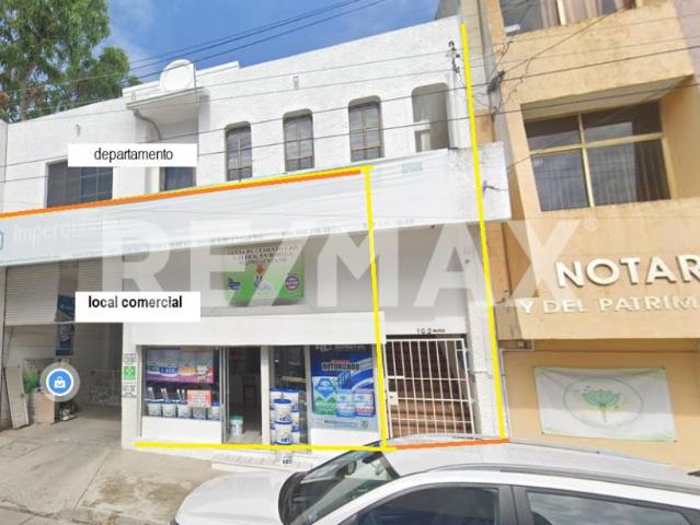 edificio con departamento en venta