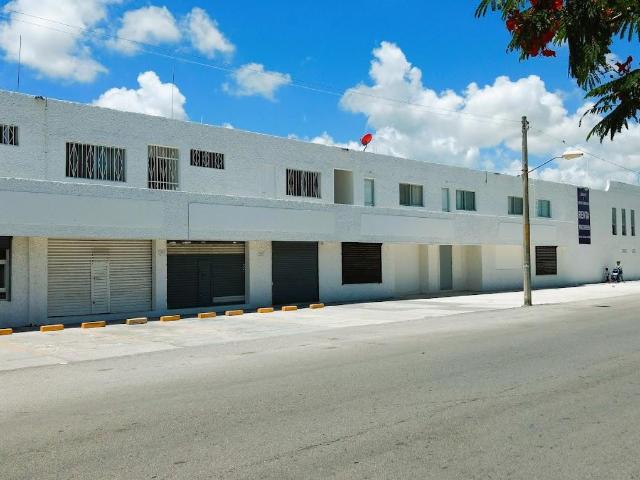 Edificio con locales comerciales y departamentos