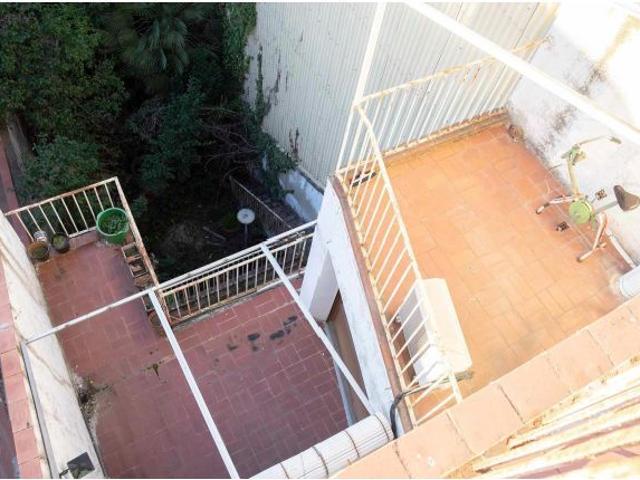 Edificio en venta con patio jardín en el Centro de Igualada
