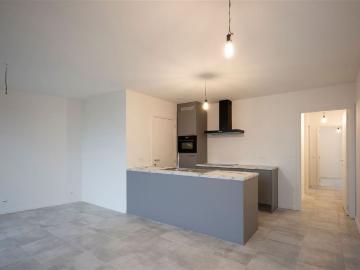 Een modern 2 slaapkamerappartement met terras