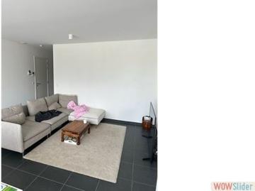 Een mooi afgewerkt appartement met terras en garage